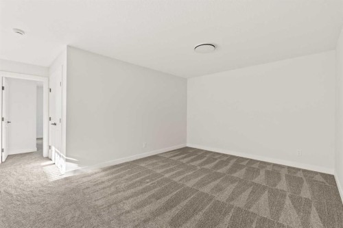 152 Creekstone Circle Sw, Calgary, AB - Indoor Photo Showing Other Room
