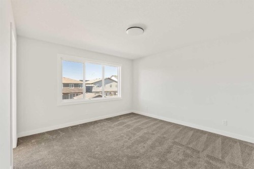 152 Creekstone Circle Sw, Calgary, AB - Indoor Photo Showing Other Room