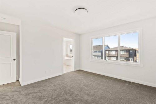 152 Creekstone Circle Sw, Calgary, AB - Indoor Photo Showing Other Room