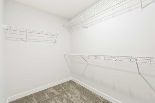 152 Creekstone Circle Sw, Calgary, AB - Indoor With Storage