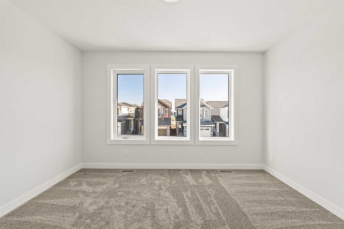 152 Creekstone Circle Sw, Calgary, AB - Indoor Photo Showing Other Room