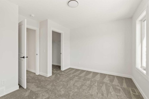 152 Creekstone Circle Sw, Calgary, AB - Indoor Photo Showing Other Room