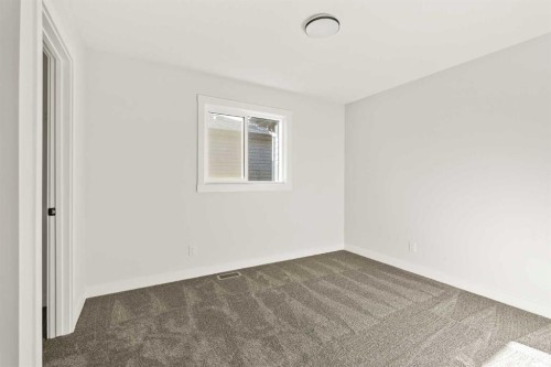152 Creekstone Circle Sw, Calgary, AB - Indoor Photo Showing Other Room