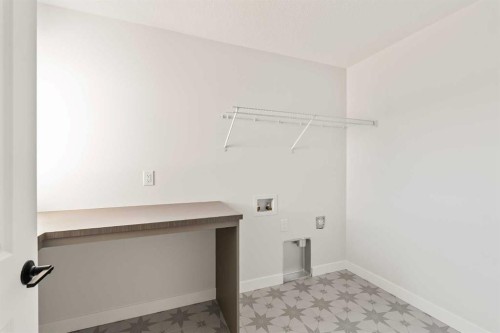 152 Creekstone Circle Sw, Calgary, AB - Indoor Photo Showing Other Room