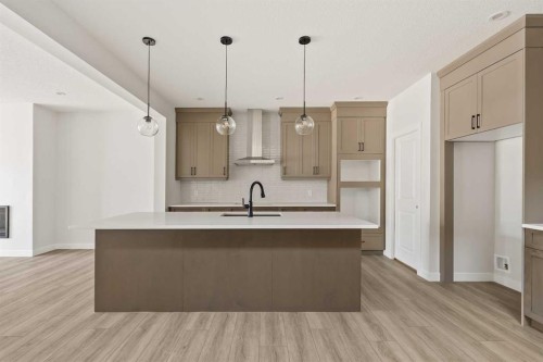 152 Creekstone Circle Sw, Calgary, AB - Indoor Photo Showing Kitchen With Upgraded Kitchen