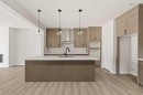 152 Creekstone Circle Sw, Calgary, AB  - Indoor Photo Showing Kitchen With Upgraded Kitchen 