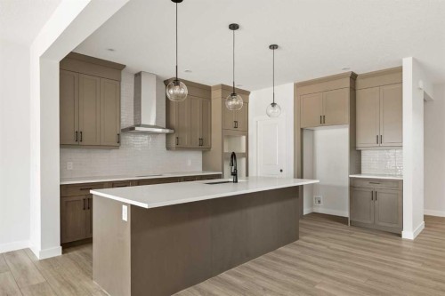 152 Creekstone Circle Sw, Calgary, AB - Indoor Photo Showing Kitchen With Upgraded Kitchen