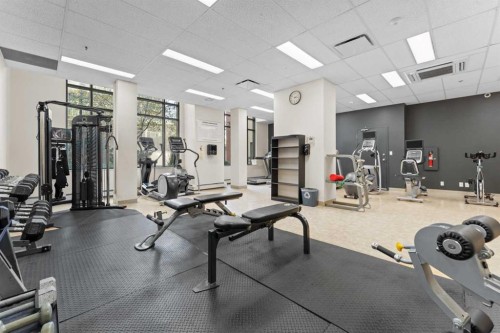 910-1111 6 Avenue Sw, Calgary, AB - Indoor Photo Showing Gym Room