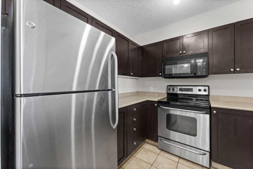 910-1111 6 Avenue Sw, Calgary, AB - Indoor Photo Showing Kitchen