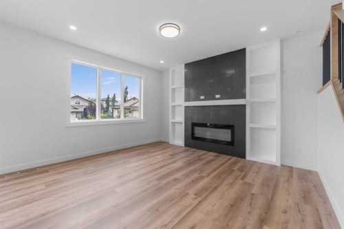17 Lakes Estates Circle, Strathmore, AB - Indoor Photo Showing Living Room With Fireplace