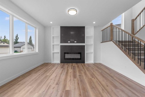 17 Lakes Estates Circle, Strathmore, AB - Indoor With Fireplace