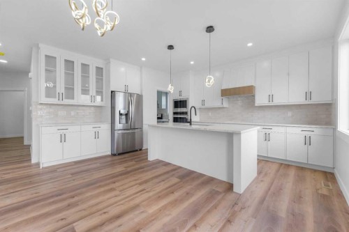 17 Lakes Estates Circle, Strathmore, AB - Indoor Photo Showing Kitchen With Stainless Steel Kitchen With Upgraded Kitchen