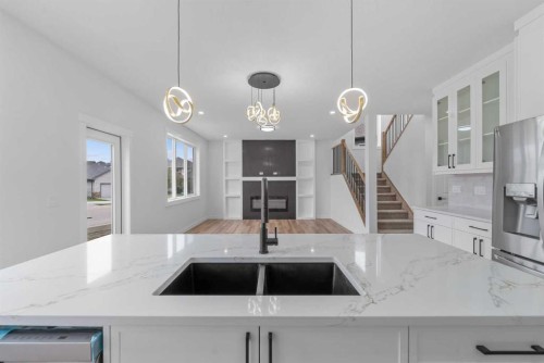 17 Lakes Estates Circle, Strathmore, AB - Indoor Photo Showing Kitchen With Double Sink
