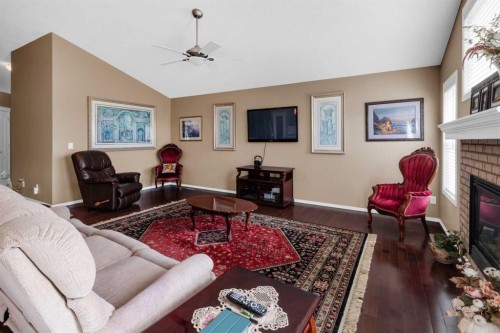 68 Nolanlake View Nw, Calgary, AB - Indoor Photo Showing Living Room With Fireplace