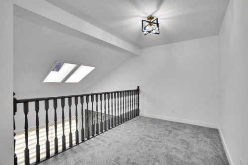 7 Deercrest Way Se, Calgary, AB - Indoor Photo Showing Other Room