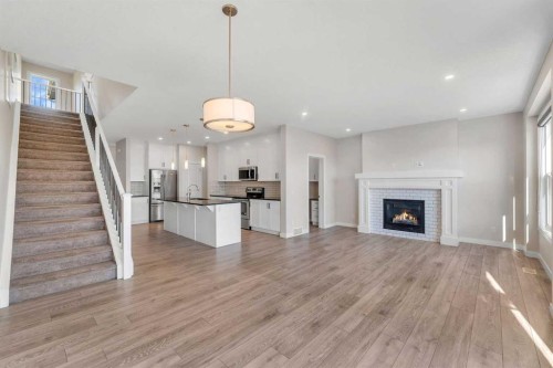 34 Sage Bluff Heights Nw, Calgary, AB - Indoor With Fireplace