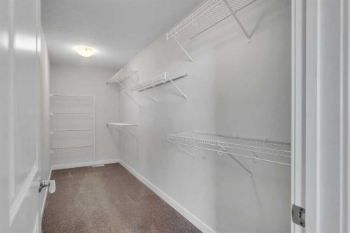 34 Sage Bluff Heights Nw, Calgary, AB - Indoor With Storage