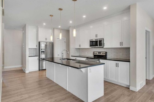 34 Sage Bluff Heights Nw, Calgary, AB - Indoor Photo Showing Kitchen With Stainless Steel Kitchen With Upgraded Kitchen