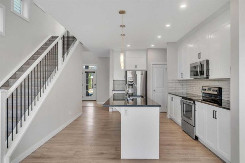 34 Sage Bluff Heights Nw, Calgary, AB - Indoor Photo Showing Kitchen With Stainless Steel Kitchen With Upgraded Kitchen