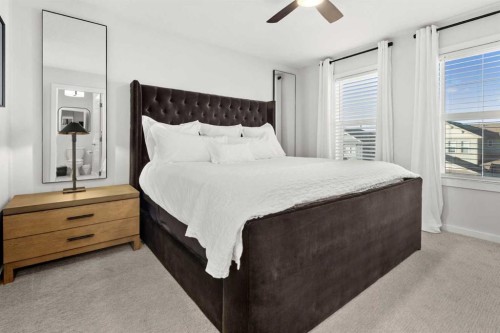 128 Heritage Heights, Cochrane, AB - Indoor Photo Showing Bedroom