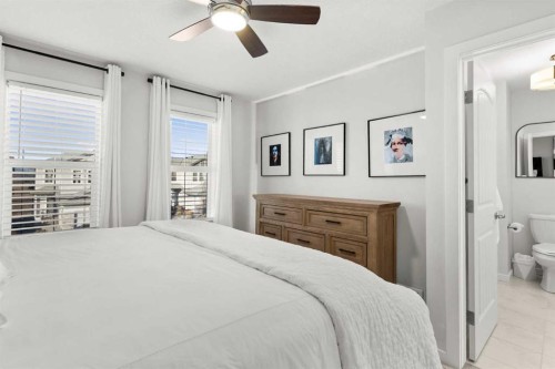 128 Heritage Heights, Cochrane, AB - Indoor Photo Showing Bedroom