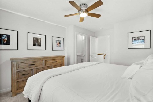 128 Heritage Heights, Cochrane, AB - Indoor Photo Showing Bedroom