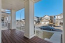128 Heritage Heights, Cochrane, AB  - Outdoor With Deck Patio Veranda 
