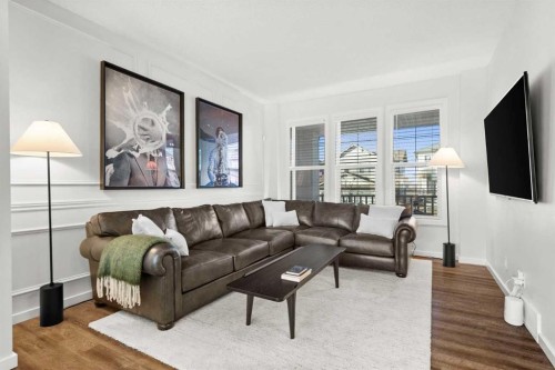 128 Heritage Heights, Cochrane, AB - Indoor Photo Showing Living Room