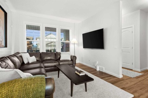 128 Heritage Heights, Cochrane, AB - Indoor Photo Showing Living Room