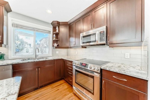 6 Mt Yamnuska Court Se, Calgary, AB - Indoor Photo Showing Kitchen With Double Sink With Upgraded Kitchen