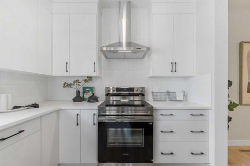 68 Buffaloberry Manor Se, Calgary, AB - Indoor Photo Showing Kitchen