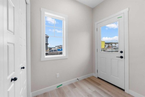 68 Buffaloberry Manor Se, Calgary, AB - Indoor Photo Showing Other Room