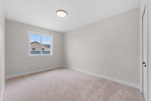 68 Buffaloberry Manor Se, Calgary, AB - Indoor Photo Showing Other Room