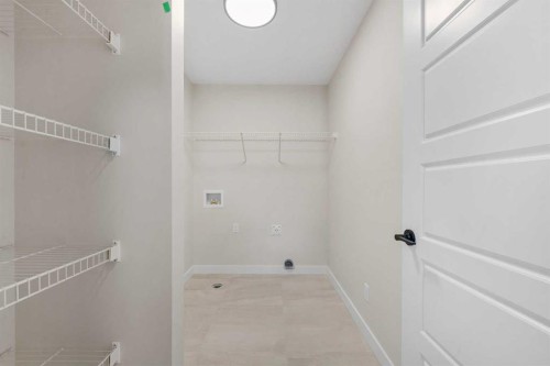 68 Buffaloberry Manor Se, Calgary, AB - Indoor With Storage