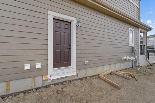 68 Buffaloberry Manor Se, Calgary, AB - Outdoor With Exterior