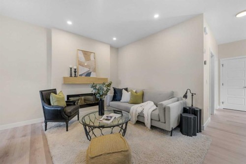 68 Buffaloberry Manor Se, Calgary, AB - Indoor With Fireplace