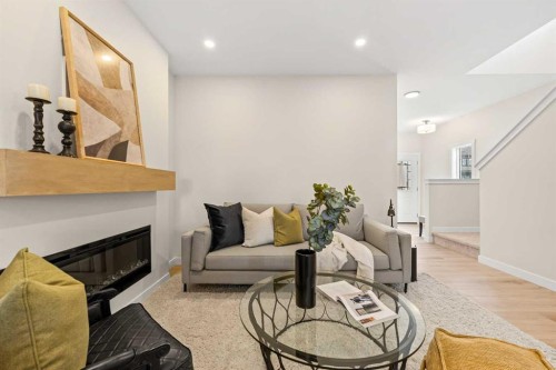 68 Buffaloberry Manor Se, Calgary, AB - Indoor With Fireplace