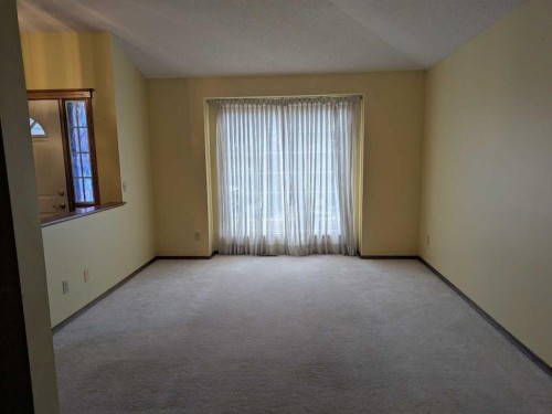 165 Woodford Drive Sw, Calgary, AB - Indoor Photo Showing Other Room