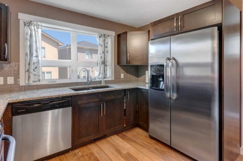 336 Covecreek Circle Ne, Calgary, AB - Indoor Photo Showing Kitchen With Stainless Steel Kitchen With Double Sink