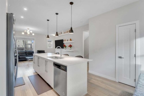 106-72 Cornerstone Manor Ne, Calgary, AB - Indoor Photo Showing Kitchen With Double Sink With Upgraded Kitchen