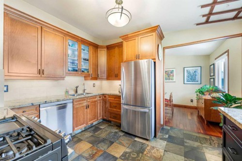 1619 47 Street Sw, Calgary, AB - Indoor Photo Showing Kitchen With Double Sink