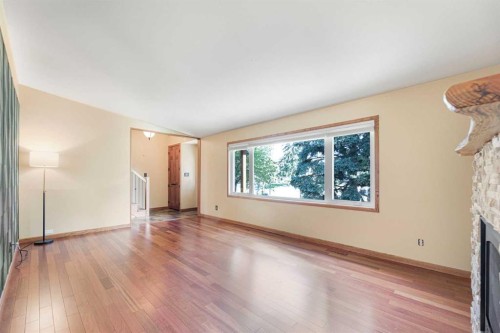 1619 47 Street Sw, Calgary, AB - Indoor Photo Showing Other Room With Fireplace