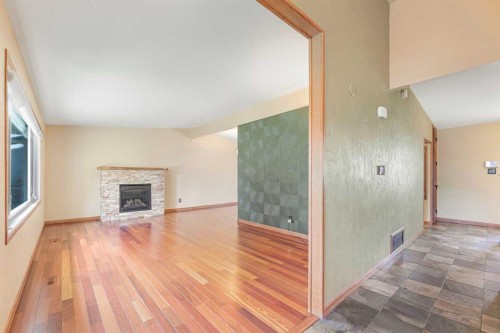 1619 47 Street Sw, Calgary, AB - Indoor Photo Showing Living Room With Fireplace