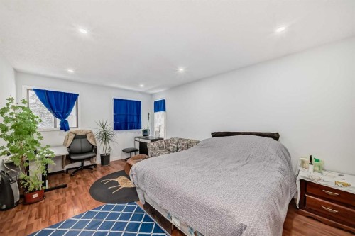 7 Hawksley Crescent Nw, Calgary, AB - Indoor Photo Showing Bedroom