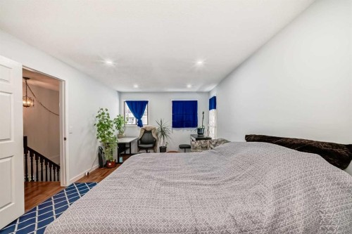 7 Hawksley Crescent Nw, Calgary, AB - Indoor Photo Showing Bedroom