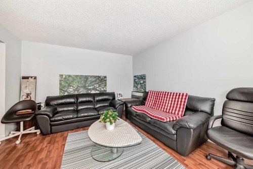 7 Hawksley Crescent Nw, Calgary, AB - Indoor Photo Showing Living Room