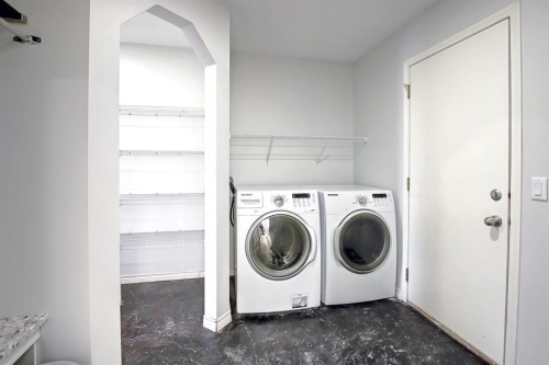 25 Panamount Crescent Nw, Calgary, AB - Indoor Photo Showing Laundry Room