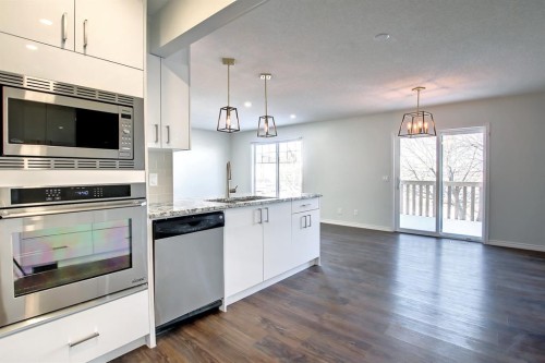 25 Panamount Crescent Nw, Calgary, AB - Indoor Photo Showing Kitchen With Upgraded Kitchen