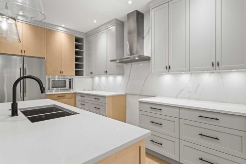 249B Three Sisters Drive, Canmore, AB - Indoor Photo Showing Kitchen With Double Sink With Upgraded Kitchen