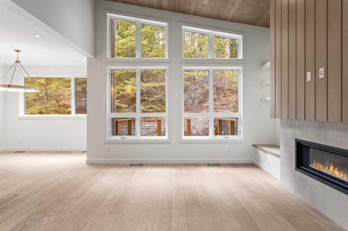 249B Three Sisters Drive, Canmore, AB - Indoor With Fireplace